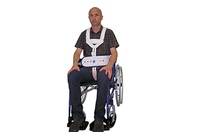 Devices for restraining and securing patients in arm-wheelchairs